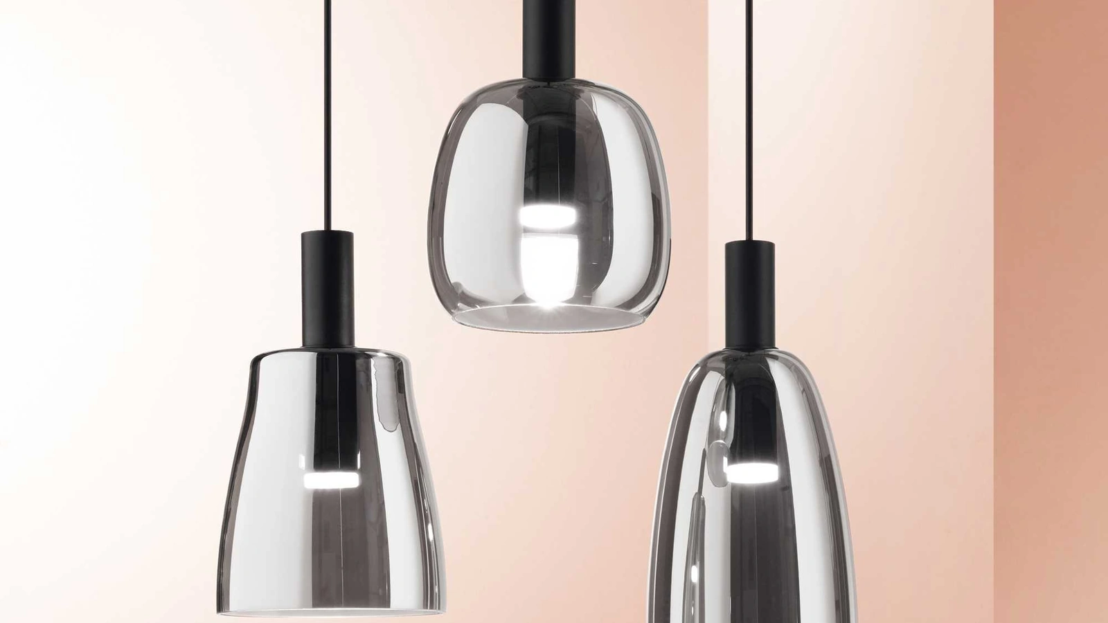 Lampada a sospensione Coco in vetro soffiato trasparente con finitura fumé di Ideal Lux