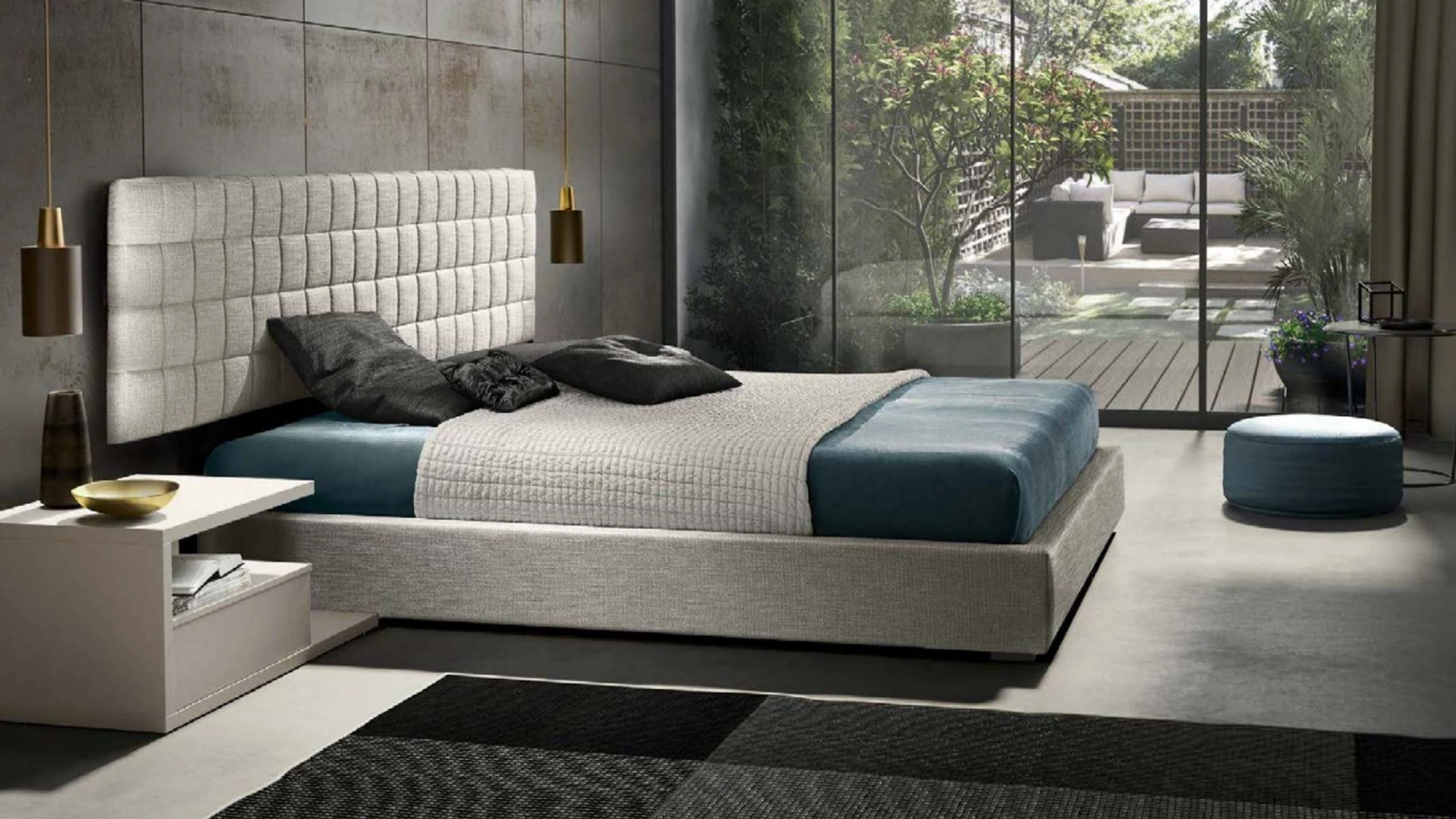 Letto sommier in tessuto Turca abbinato alla testiera PN1 di Abitare Mobilstella