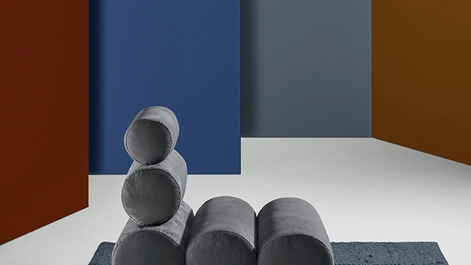 Poltrona di design composta da cilindri imbottiti Aris di Excò