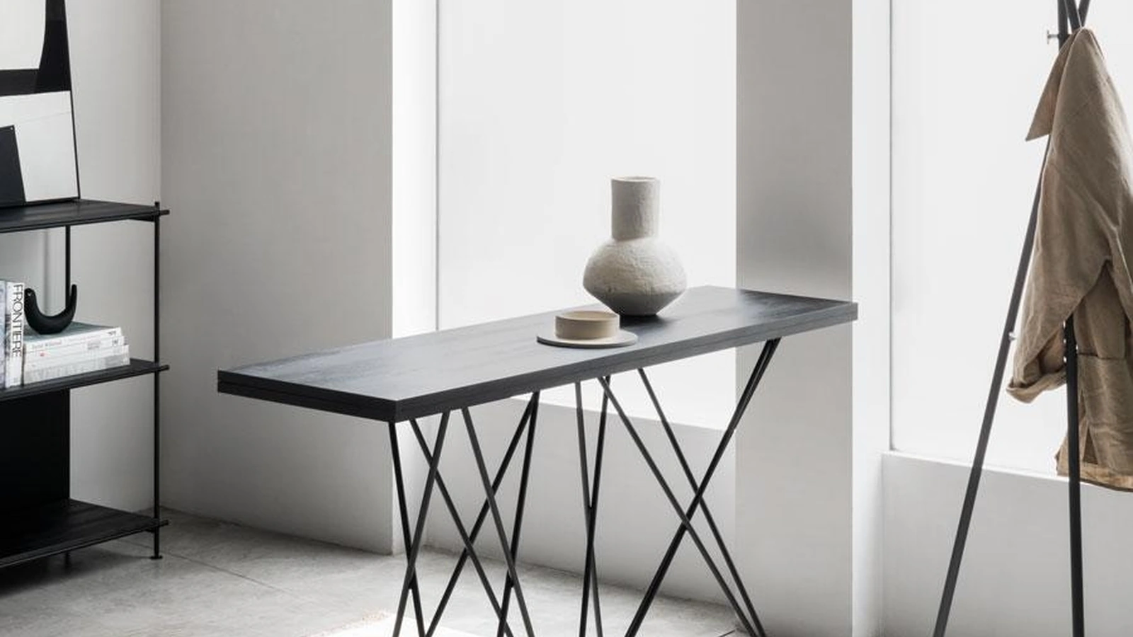 Consolle trasformabile con apertura a libro del top Hermes di Pezzani